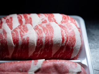 Canvas Print - sliced ​​frozen raw meat