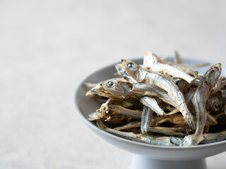 Canvas Print - Dried anchovies on a plate