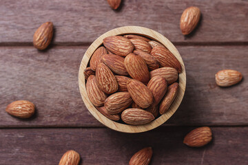 Almond snack fruit in wooden bowl