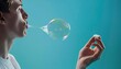 © Paulius - Bubble Blowing: Up Close with a Young Man on a Blue Background