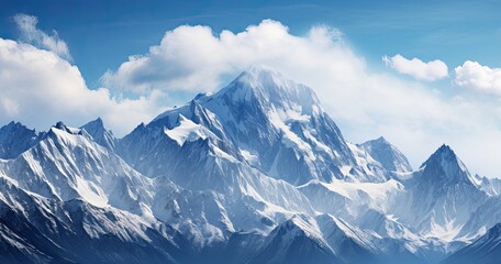 Wall Mural - Mountains peaks crowned with snow, sunny sky resort background