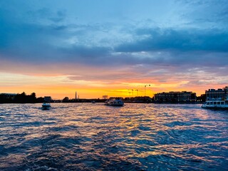 Wall Mural - Fantastic sunset at the city river 