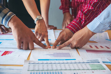 Wall Mural - Top view business people meeting together at office desk in conference room. Team business meeting partnership planning brainstorming together. Team Collaborate group of partner company brainstorming