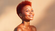 © ALA - Beautiful, sexy, happy smiling dark-skinned African American woman with perfect skin and red hair, on a creamy beige background, banner.