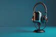© SH Design - microphone with headphones on blue background for podcast concept.