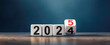 © SHOHID Graphics - 2025 number of with change to new era concepts. Flipping the 2024 to 2025 year calendar numbers on white dice, cube blocks isolated on dark blue banner background, minimalist simple style