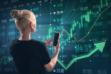 Wall Mural - Attractive young european woman using smartphone with growing green forex chart and arrows on blurry background. Index, finance and market growth concept. Double exposure.