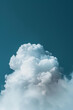 © tonstock - Fluffy white cloud formation in a clear blue sky, capturing the serene beauty of nature and weather. Perfect for backgrounds and nature-themed projects.