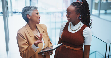 Wall Mural - Businesspeople, tablet and consult with smile in office for advice with manager for executive assistance. Women, happy and tech for communication with support in workplace for coaching or help.