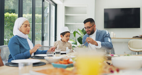 Canvas Print - Islamic, family and dinner at dining table for ramadan, muslim celebration and eating food at home. Eid mubarak, culture and religious gathering with mother, father and son for bonding in apartment