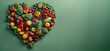 © Robert Kneschke - Heart shape made from various fresh fruits and vegetables on green background