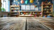© Zahfran - Wooden desk on blurred child room or kindergarten interior background