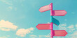 © mahnoor - Wooden signpost with arrows on blue sky background