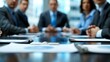 © Антон Сальников - Several corporate business people and a manager are meeting close-up.