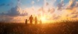 © TigerDude - Family of four holding hands, walking in a field at sunset with corn plants growing around them