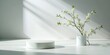 © Sangpan - Minimalistic render of a white podium with a flower branch and green beauty product, with a shadow in the background, , background, white, podium, display, flower branch, shadow, green
