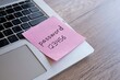 © izzuan - Sticky note with the word 'password 123456' on a laptop keyboard. Data protection, password strength concept.