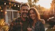 © tanongsak - photograph of Happy young couple holding home keys after buying real estate - Husband and wife standing outside in front of their new house telephoto lens ambient lighting