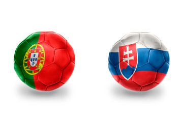 football balls with national flags of slovakia and portugal ,soccer teams. on the white background.