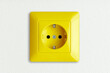 © chbsc - golden socket outlet on white wall