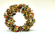 © Igor - Artificial green brown wreath with leaves cones berries isolated on white