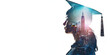 © Ekaterina - A double exposure image of a student in a graduation cap combined with a city skyline, symbolizing education and urban opportunities, banner with copy space