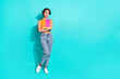 © deagreez - Full length photo of confident charming woman wear pink orange top arms folded empty space isolated teal color background