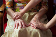 © Solarisys - Female senior old hands and child's hands - selective focus.
