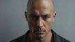 © Olena Yefremkina - Bald man looking at camera, concept of mid-life crisis in men, hair loss, biological clock.