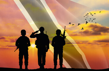 Wall Mural - Silhouettes of soldiers with a background of the Trinidad and Tobago flag and a sunset or sunrise. Concept of national holidays. Commemoration Day.