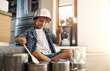 © Lyndon/peopleimages.com - Children, drums and pots with boy on floor of home kitchen, having fun making loud music sound. Fantasy, happy or smile and confident young kid playing cookware utensils in apartment for audio
