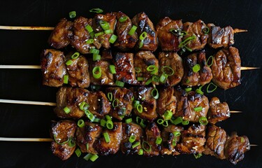 Wall Mural - Grilled Teriyaki Chicken Skewers With Green Onions and Sesame Seeds