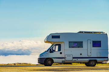 Sticker - Rv caravan in mountains above clouds