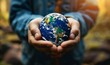 © Rising Monk - hands holding an earth globe, tiny planet,  protecting the earth, ecology, taking care of nature, global warming, human impact on nature, renewable energies, CSR, Generative AI