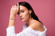 © Beauty Hero - Photo of girl wear white shirt touch hand face with diamond bracelet isolated pink color background