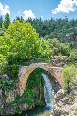 Wall Mural - Clandras Köprüsü  is an ancient bridge in Turkey, the one arch bridge was constructed during the Phrygian era of Anatolia. Arch structures were introduced during  the Roman period in Uşak.