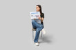 © Pixel-Shot - Thoughtful young woman with newspaper on grey background