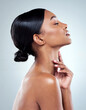 © CoetzeeRising/peopleimages.com - Skincare, woman and face in side view for beauty transformation with facial treatment in studio. Dermatology, female person or model with natural glow from cosmetics or collagen for wellness