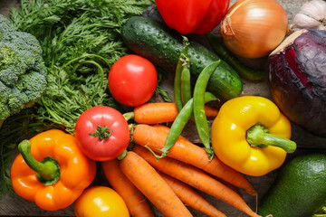 Wall Mural - Different fresh vegetables on grey wooden background