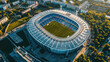 © karina_lo - Aerial view of soccer stadium in city, exterior of modern football arena from above in summer. Concept of world cup, sport, championship