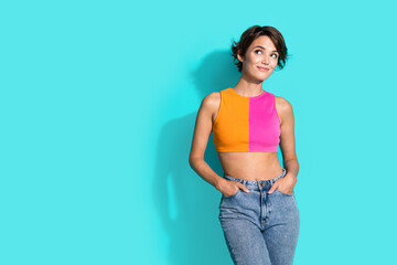 Poster - Photo of dreamy sweet woman wear pink orange top smiling looking empty space isolated teal color background