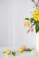 Wall Mural - beautiful bouquet in white vase in sunlight