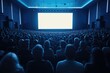 © vefimov - A large group of people sitting in front of a big screen, enjoying a film