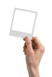 © kite_rin - Vintage Polaroid mockup in hand - clipping path, Studio shot of instant photo frame isolated in transparent PNG, polaroid frame - isolated design element