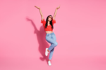 Sticker - Full size photo of pretty young woman raise hands dancing wear top isolated on pink color background