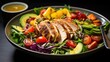 © Varunee - Photograph of a colorful and healthy salad with a variety of fresh vegetables, grilled chicken, and a light vinaigrette dressing
