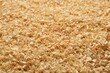 © New Africa - Dry natural sawdust as background, closeup view