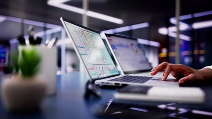 Canvas Print - Female African American Data Analyst Predicting Market Trends on Virtual KPI Dashboard