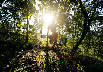 Sticker - Woman runner running on forest trail