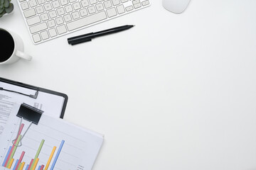 Poster - Top view financial reports and cup of coffee on white office desk